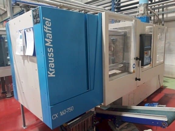 Vista frontal de la máquina Krauss Maffei KM 160-750 CX