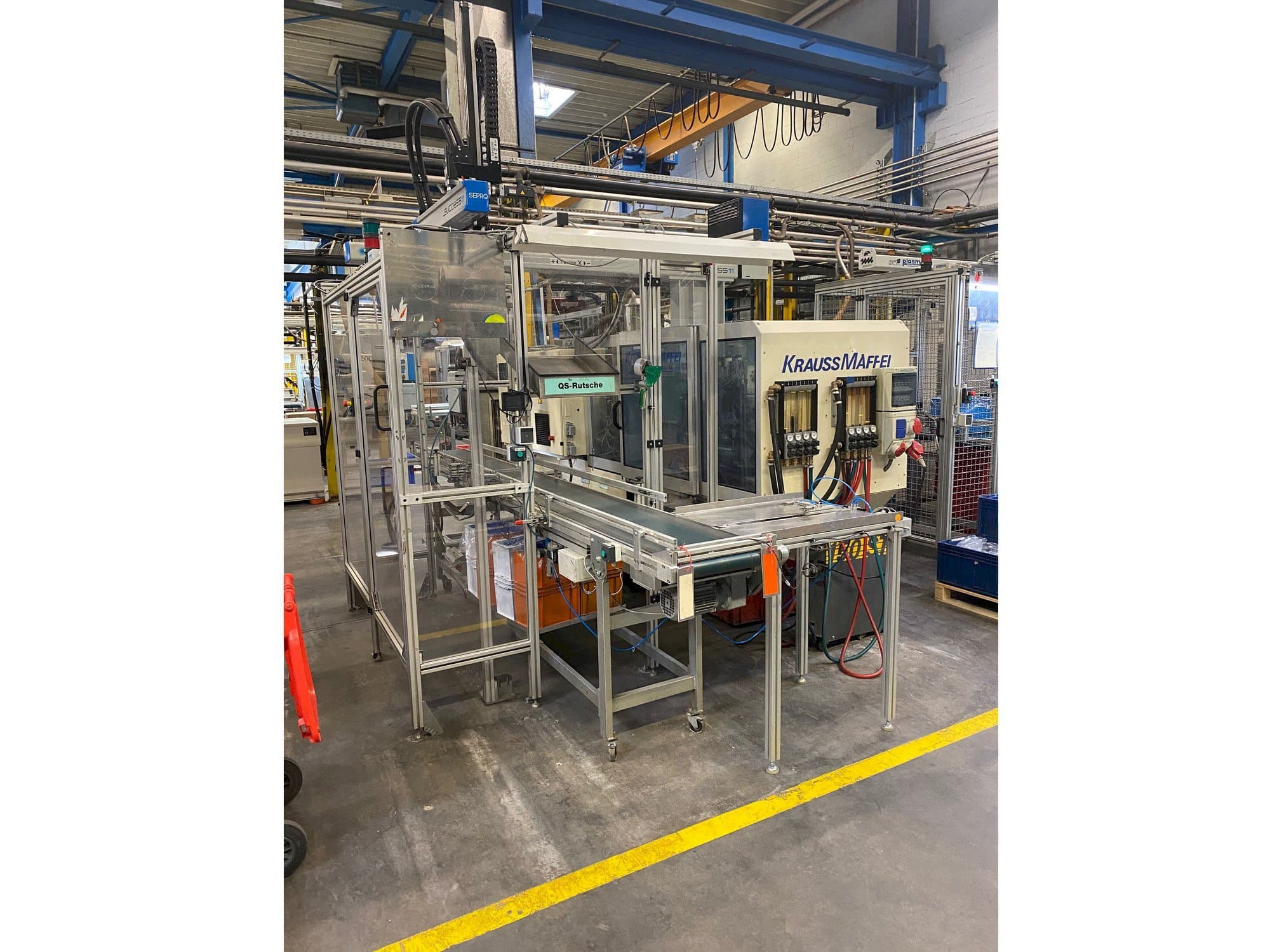 Vista frontal de la máquina Krauss Maffei 80-390 C2