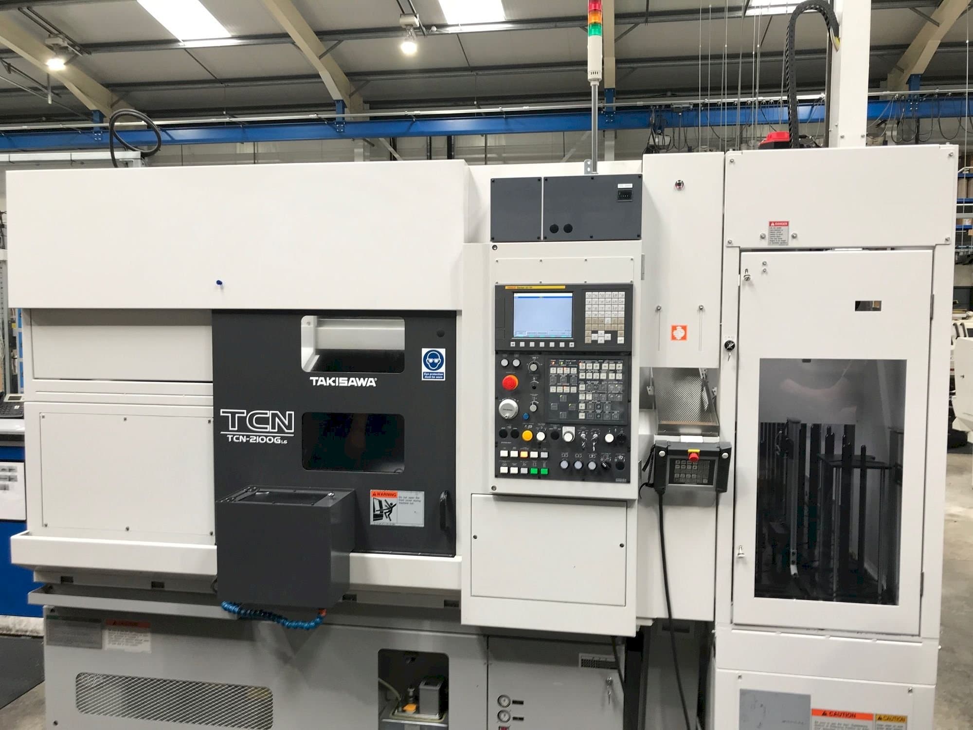 Vista frontal de la máquina Takisawa TCN-2100G L6