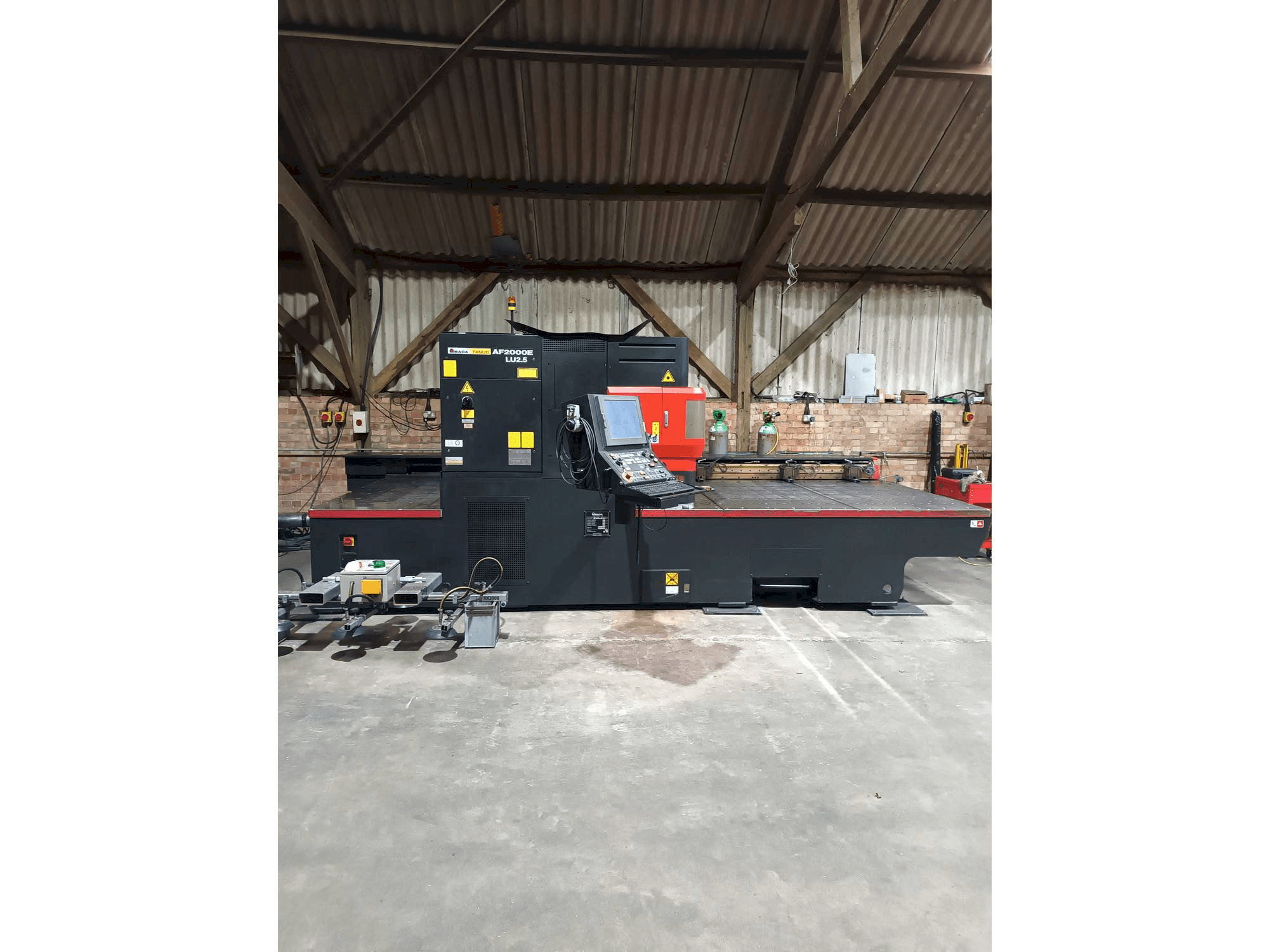 Front view of AMADA LC 2415 alpha 4 NT machine