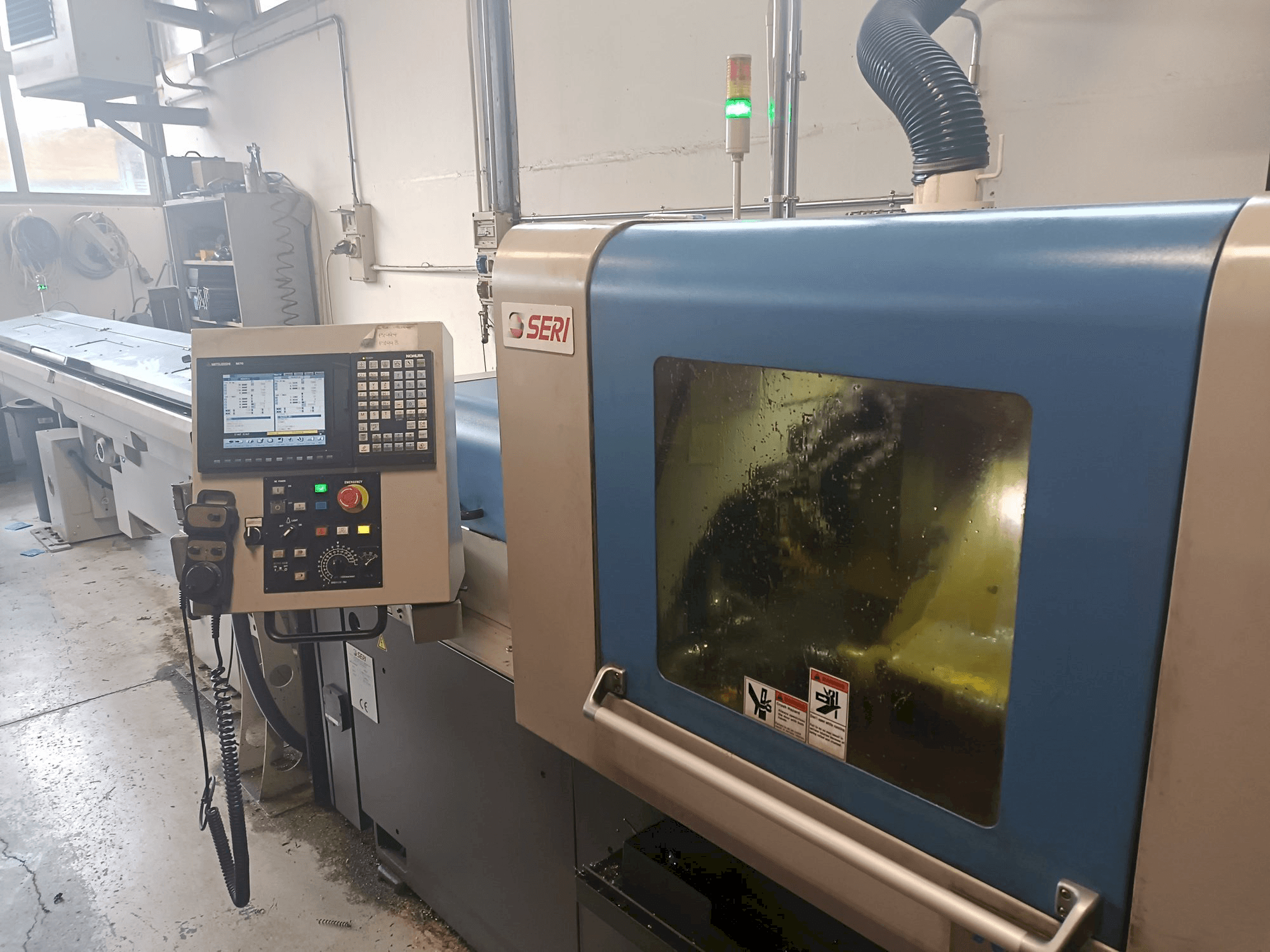 Front view of NOMURA machine